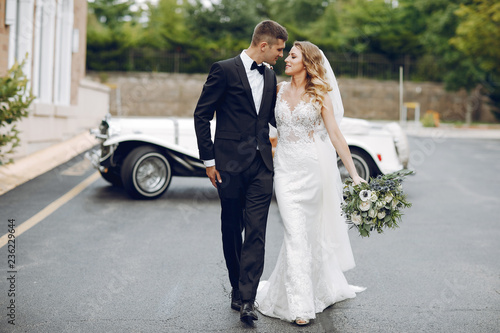 Couple near old car