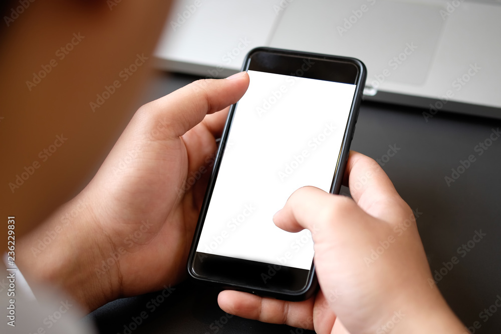Cropped shot businessman in suit using mockup smartphone. Cropped shot businessman in suit using mockup smartphone.
