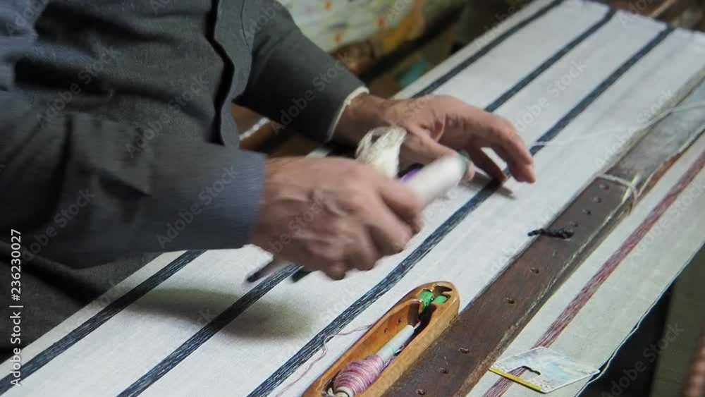 Hand loom worker in Fez, Morocco Hand loom worker in Fez, Morocco