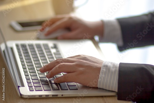 Hand typing on computer keyboard.On line business and business ideas