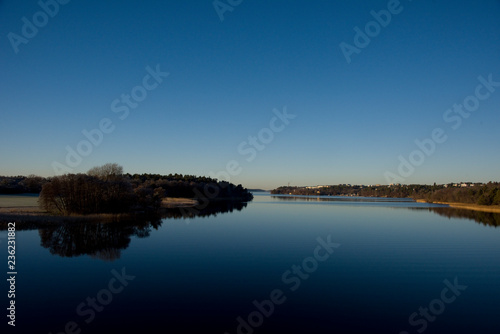 Canvas Print Cold frosty day at the lake Malaren by boat in Stockholm