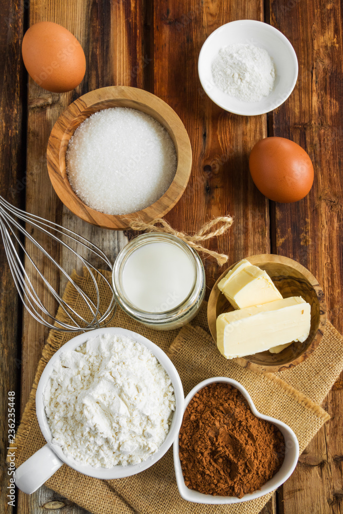 The Process Baking Cake In Kitchen - Dough Recipe Ingredients Eggs, Flour,  Milk, Butter, Sugar On Table From Above. Bake Sweet Cake Dessert Concept.  Top View. Stock Photo, Picture and Royalty Free