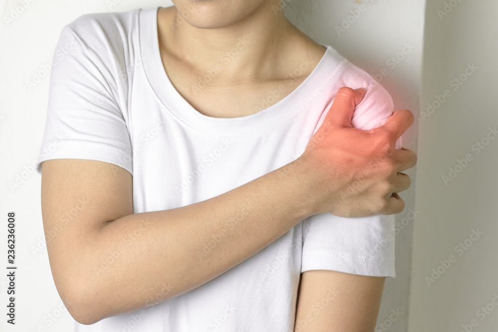 Woman with pain in shoulder. Woman with pain in shoulder.