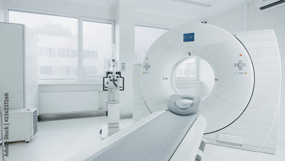 © Gorodenkoff - Medical CT or MRI or PET Scan Standing in the Modern Hospital Laboratory. Technologically Advanced and Functional Mediсal Equipment in a Clean White Room. © Gorodenkoff - Medical CT or MRI or PET Scan Standing in the Modern Hospital Laboratory. Technologically Advanced and Functional Mediсal Equipment in a Clean White Room.