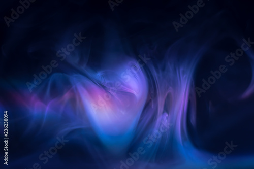 purple, blue, pink smoke (evaporation) on a black background