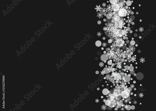 Winter frame with white snowflakes for Christmas and New Year celebration. Horizontal winter frame on black background for banners, gift coupons, vouchers, ads, party events. Falling frosty snow.