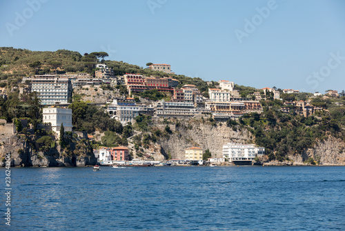 View of houses and hotels on the cliffs in Sorrento. Gulf of Naples, Campania, Italy