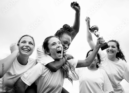 Fototapeta Naklejka Na Ścianę i Meble -  Cheerful football players celebrating their victory
