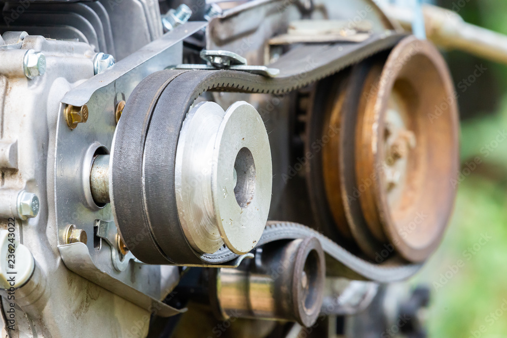 Agricultural machine part. Pulley and belt transmission