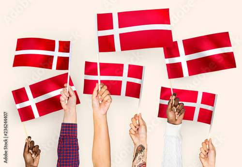 Hands waving the flags of Denmark © Rawpixel.com