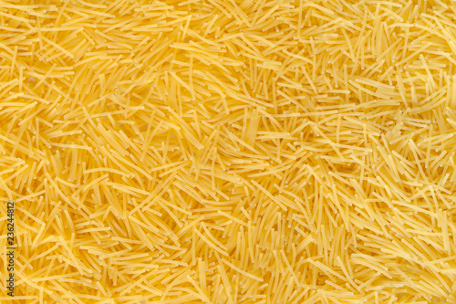 Macaroni and vermicelli scattered as a background