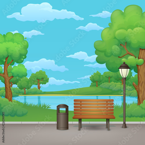 Summer, spring day park. Wooden bench, trash bin and street lamp on an asphalt park trail with a lake in the background.