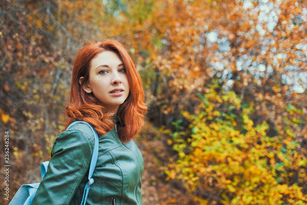 Young woman with autumn tree. Young woman with autumn tree.