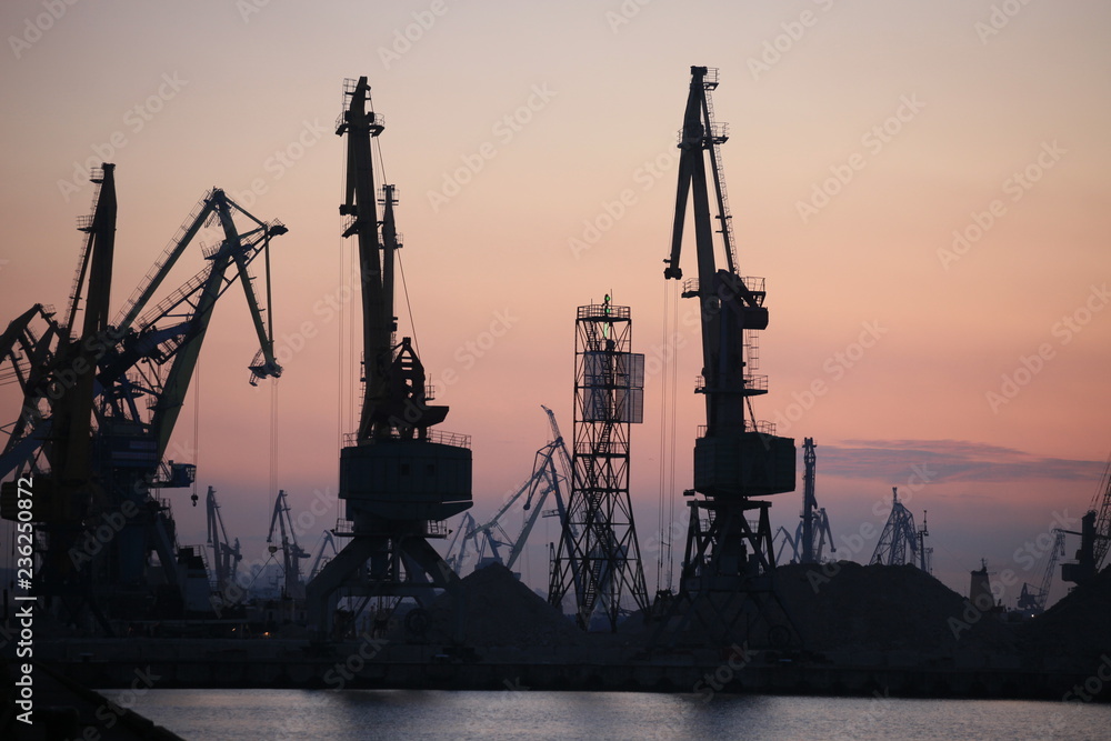 Ganrty cranes in the sea port on the coast of the Azov Sea at night