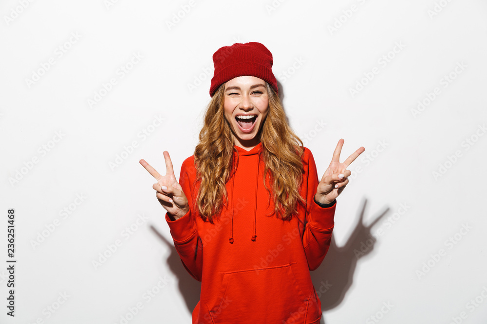 Portrait of stylish woman 20s wearing casual clothes laughing while standing, isolated over white background Portrait of stylish woman 20s wearing casual clothes laughing while standing, isolated over white background