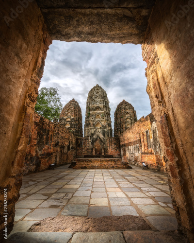 Wat Sri Sawai  Sukhothai Historical Park. The sanctuary surrounded by a laterite wall is set in attractive park consists of three large Khmer style prangs and two viharns.