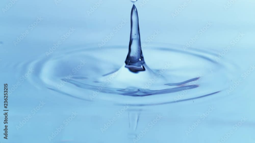 Super slow motion of dripping water drop filmed with macro lens. Filmed on high speed cinema camera, 1000 fps. Super slow motion of dripping water drop filmed with macro lens. Filmed on high speed cinema camera, 1000 fps.