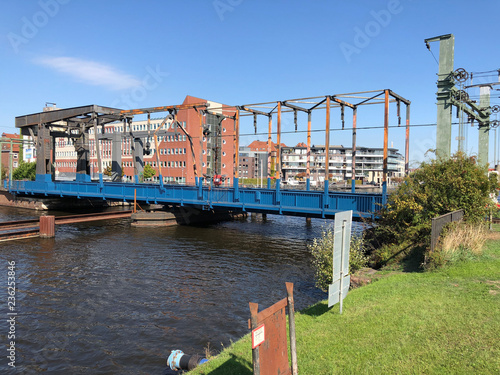 Fotografia, Obraz Train track bridge in Emden