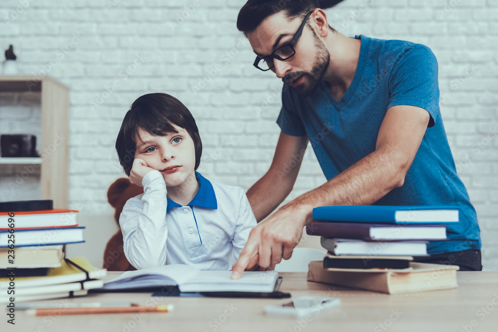 Father is Doing a Homework with Son Father is Doing a Homework with Son