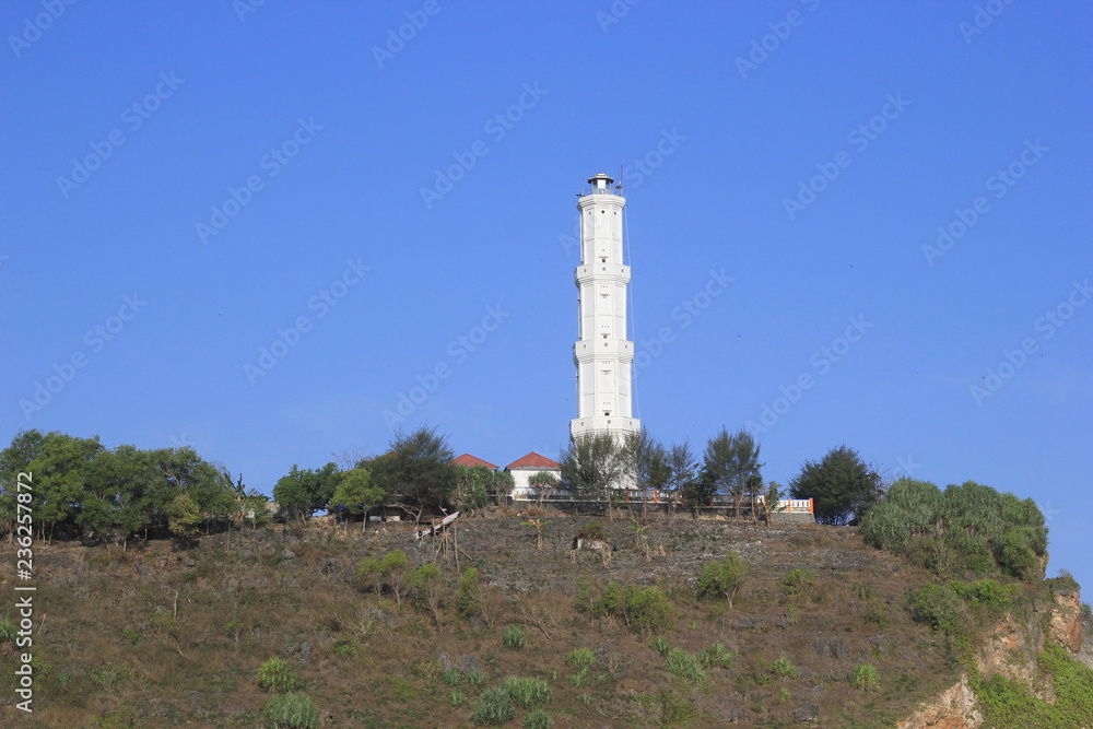 lighthouse building on the beach cliff lighthouse building on the beach cliff