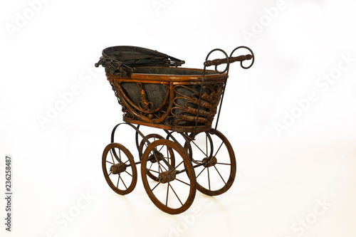 Old-fashioned stroller isolated.