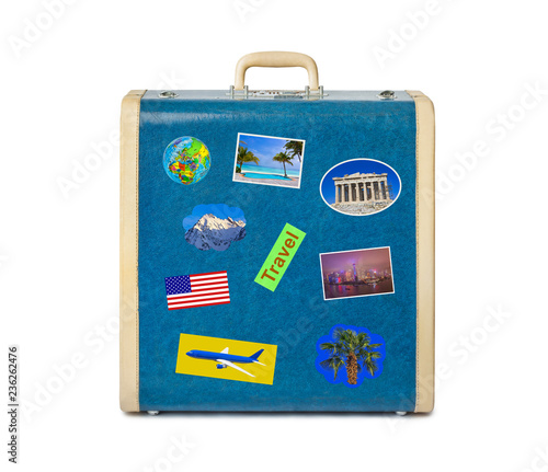 Vintage suitcase with travel stickers