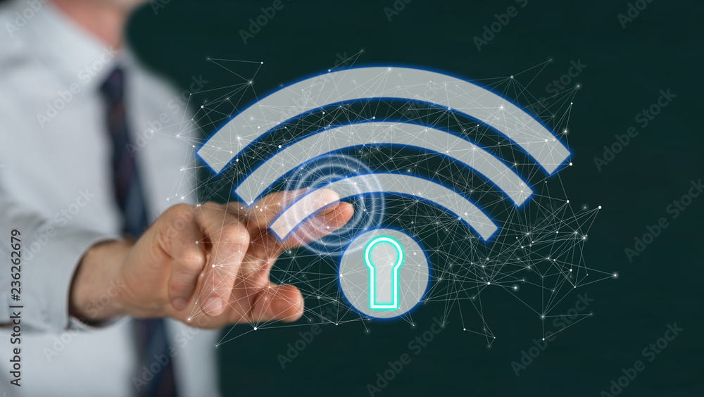 Man touching a wifi security concept - obrazy, fototapety, plakaty 