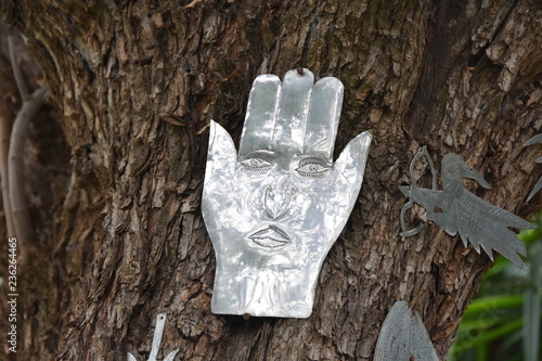 Metal luck sign Hamsah in Anima garden, Marrakesh, Morocco