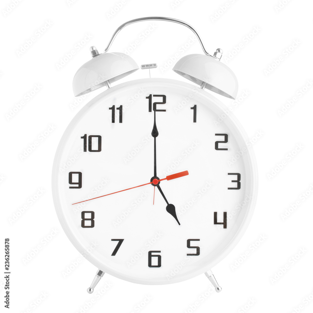 White alarm clock showing five o'clock isolated on white background White alarm clock showing five o'clock isolated on white background