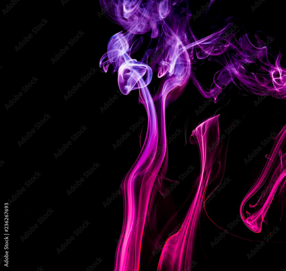 Colored smoke on black background Colored smoke on black background