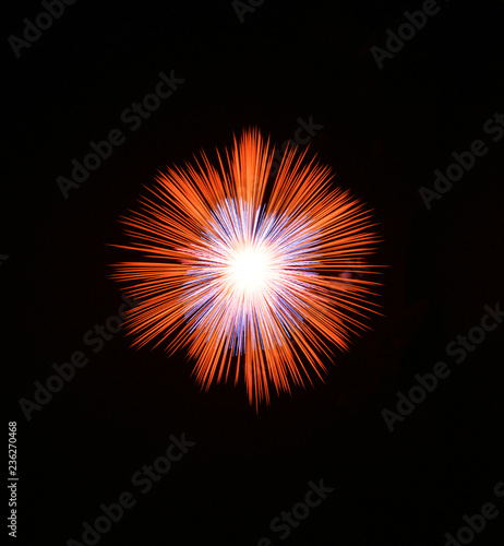 Golden orange amazing fireworks isolated in dark background close up with the place for text  Malta fireworks festival  4 of July  Independence day  New Year  explode