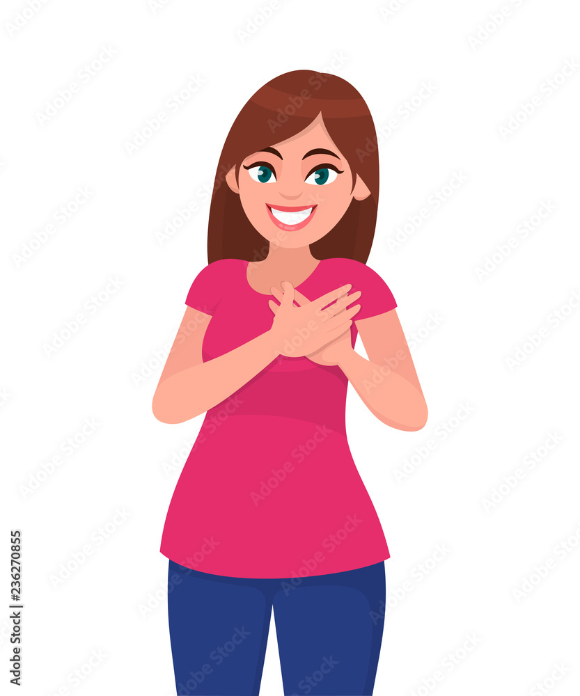 Pleasant looking kind hearted young woman keeps hands on chest