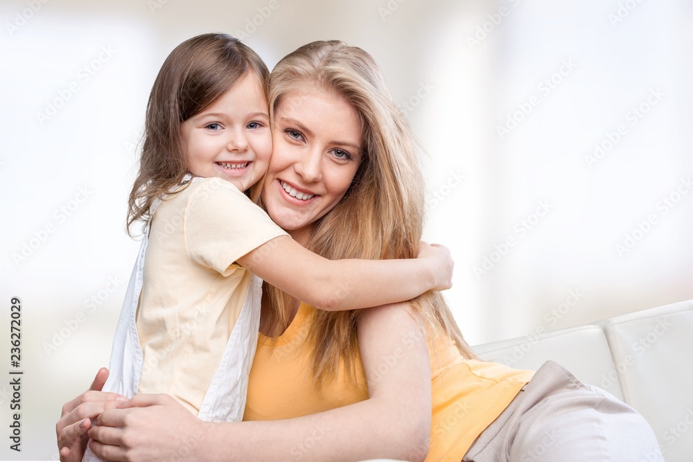 Happy Mother and daughter hugging Happy Mother and daughter hugging