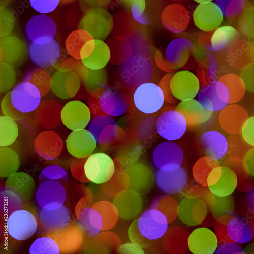Seamless texture multi-colored lanterns, festive background in blur.