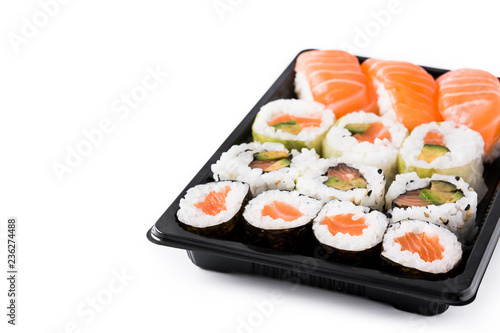sushi assortment on black tray isolated on white background. Copyspace