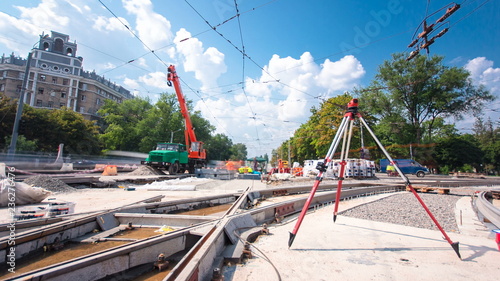 Photography Installing concrete plates by crane at road construction site timelapse hyperlapse