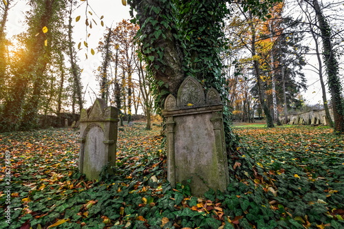 two headstones at an old graveyard
