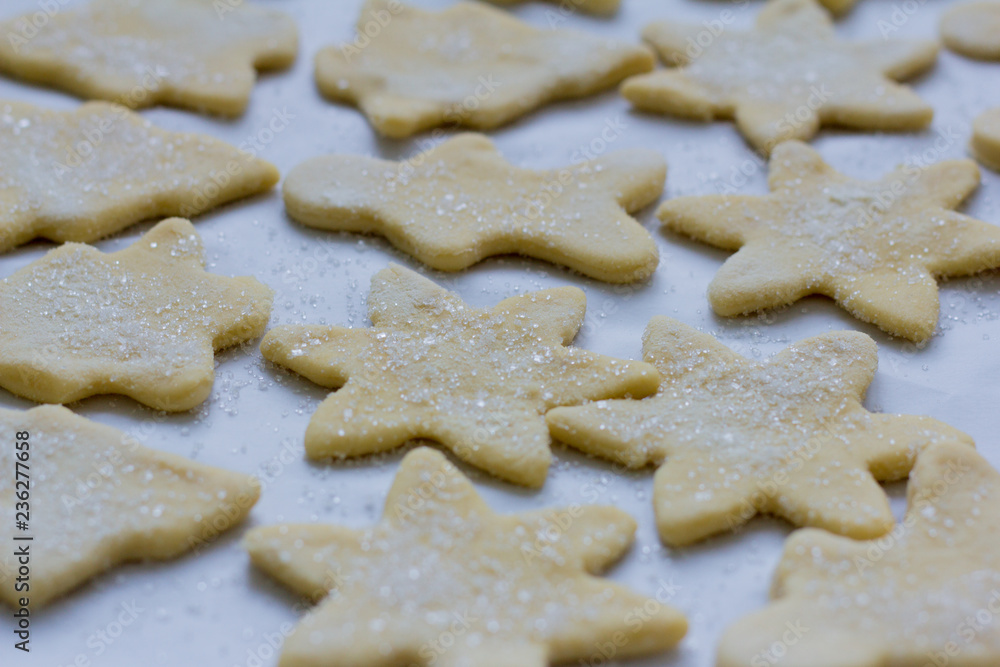 cut out figures from dough for baking cookies cut out figures from dough for baking cookies