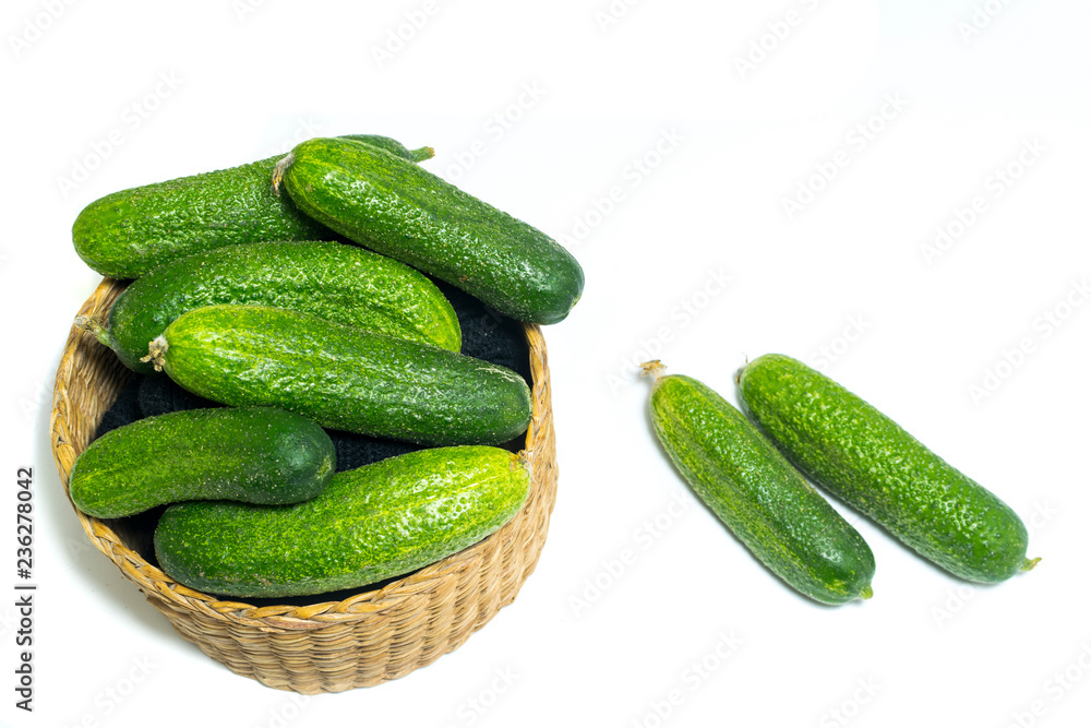 Fresh , green cucumbers in box isolated on white background Fresh , green cucumbers in box isolated on white background