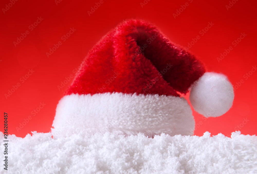 Red Santa Hat and white snow. Christmas background. Red Santa Hat and white snow. Christmas background.