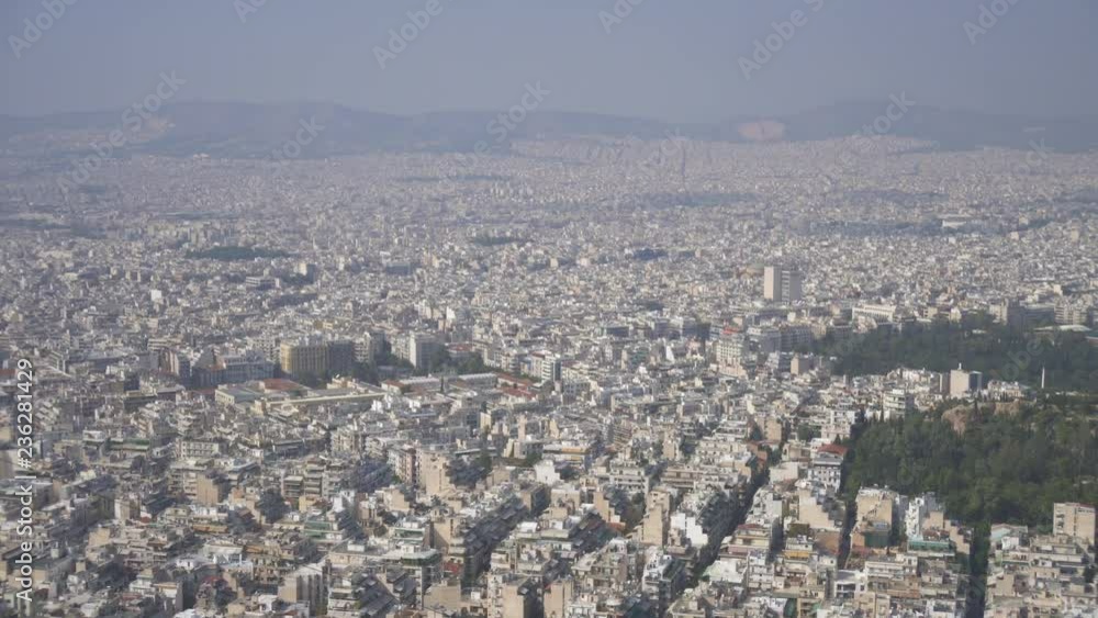 Aerial view on rooftops and houses in Athens, Greece. Aerial view on rooftops and houses in Athens, Greece.