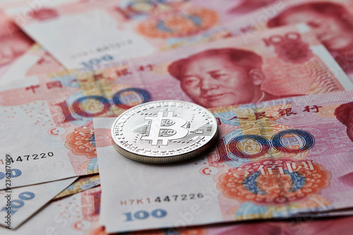 Bitcoin with Chinese banknotes 