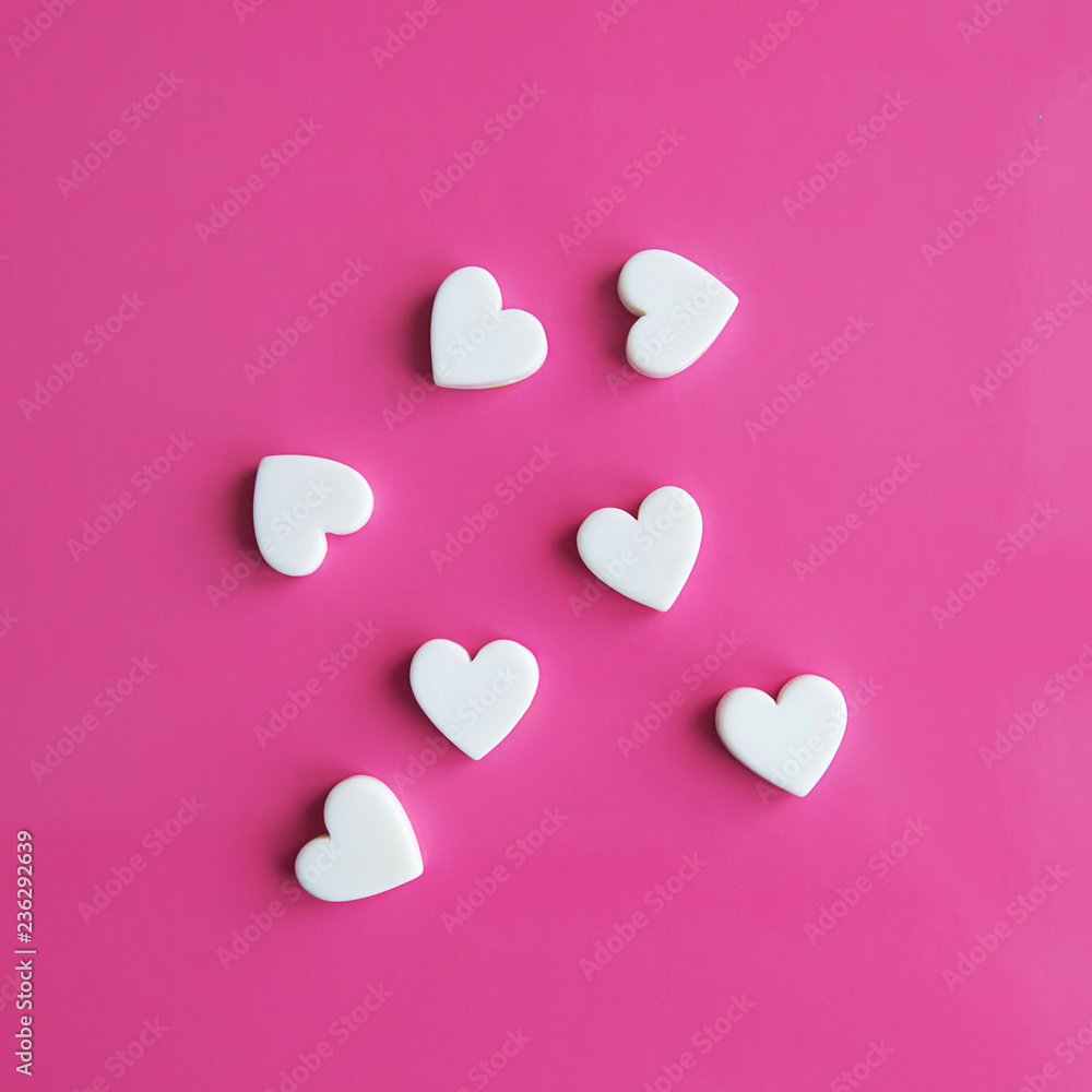 Hearts on pink background, love and Saint Valentine day concept. Wedding celebration.