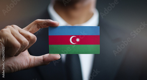 Businessman Holding Card of Azerbaijan Flag