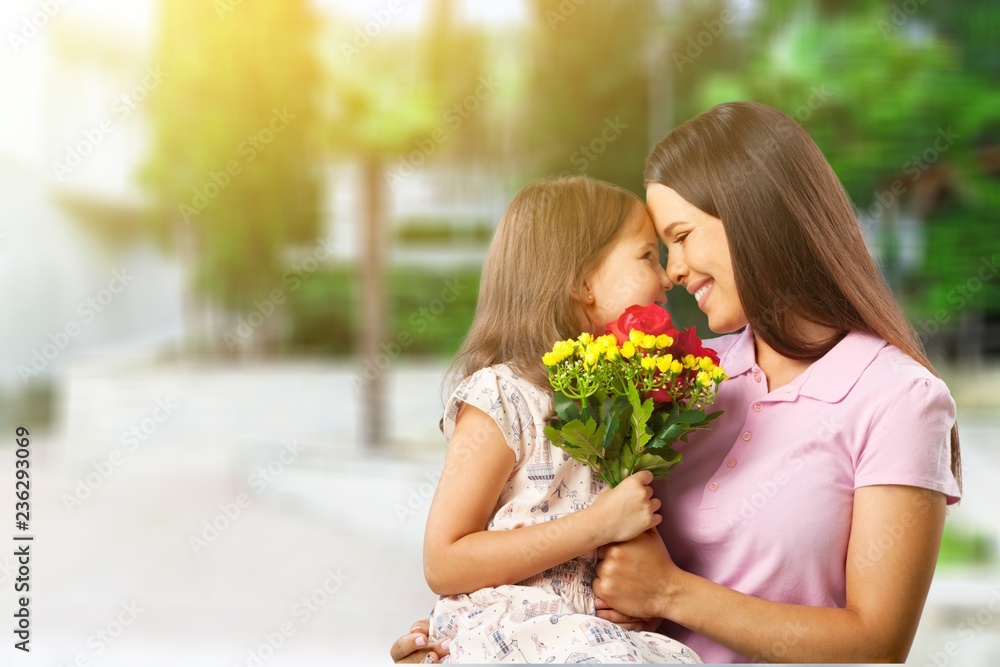 Happy Mother and daughter hugging Happy Mother and daughter hugging