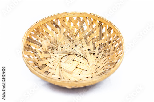 Close up of empty vegetable or fruit basket isolated on white.