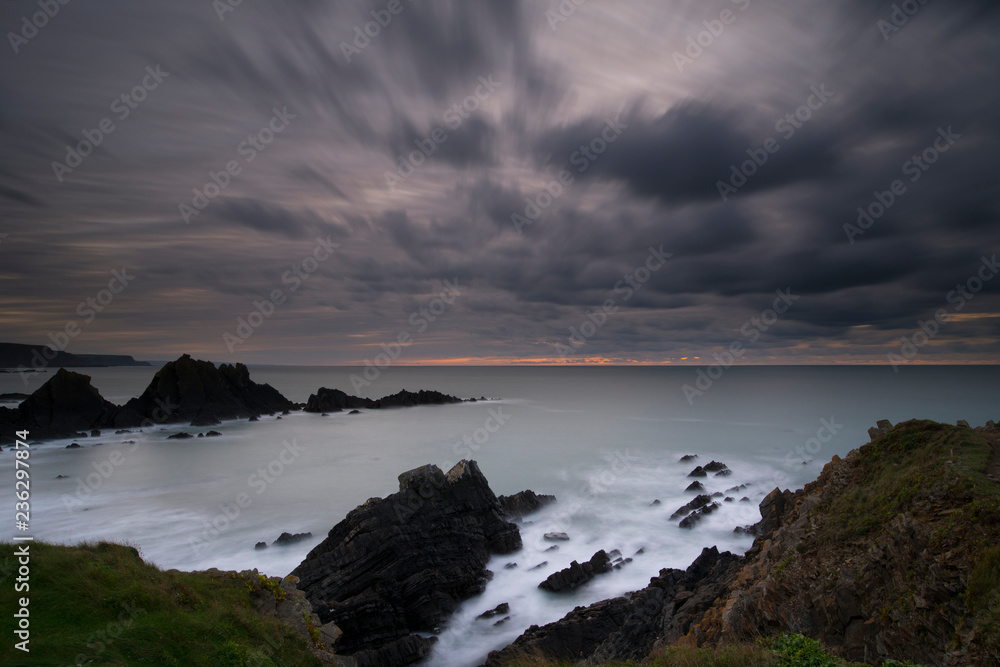 Sunset in cornwall at Hartland quay Sunset in cornwall at Hartland quay