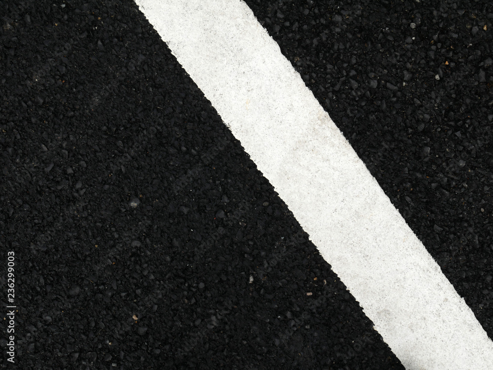 Fototapeta premium Black paved road background.