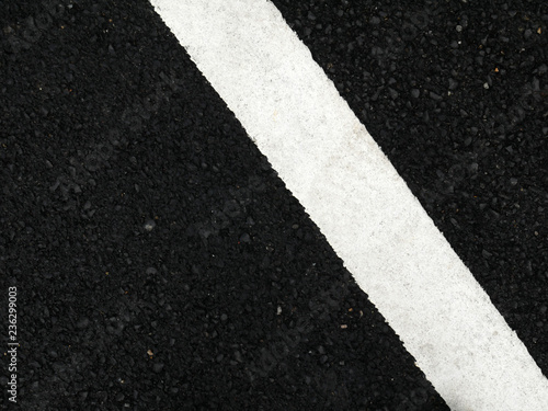 Black paved road background. © ruttanapol