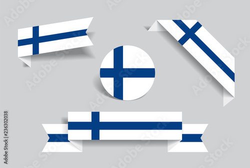 Finnish flag stickers and labels. Vector illustration.